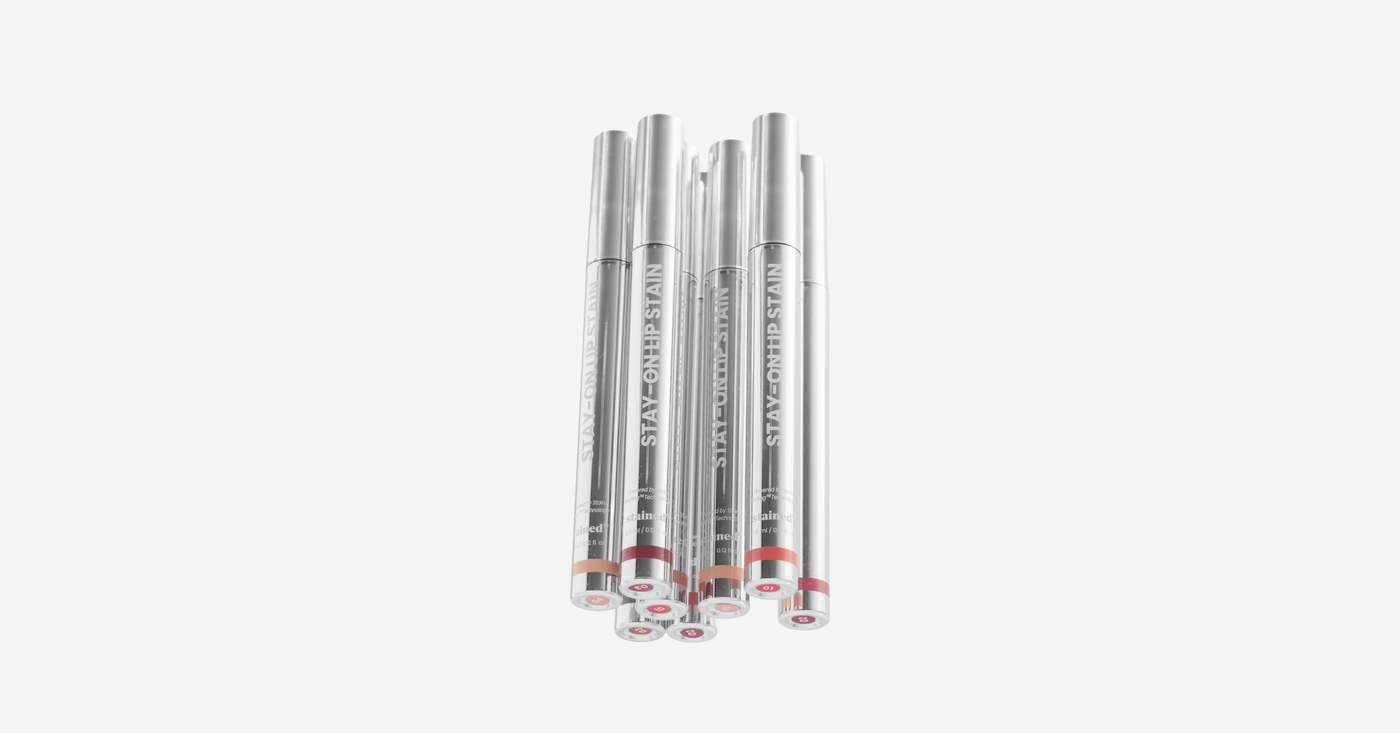Stay-On Lip Stain product lineup showing all shades on white background