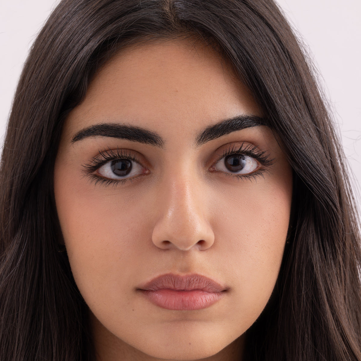 Model with natural bare lips in close-up view