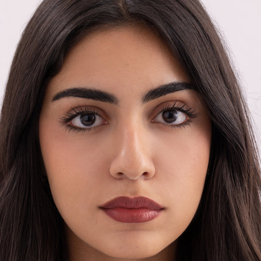 Model wearing Stay-On Lip Stain in close-up view